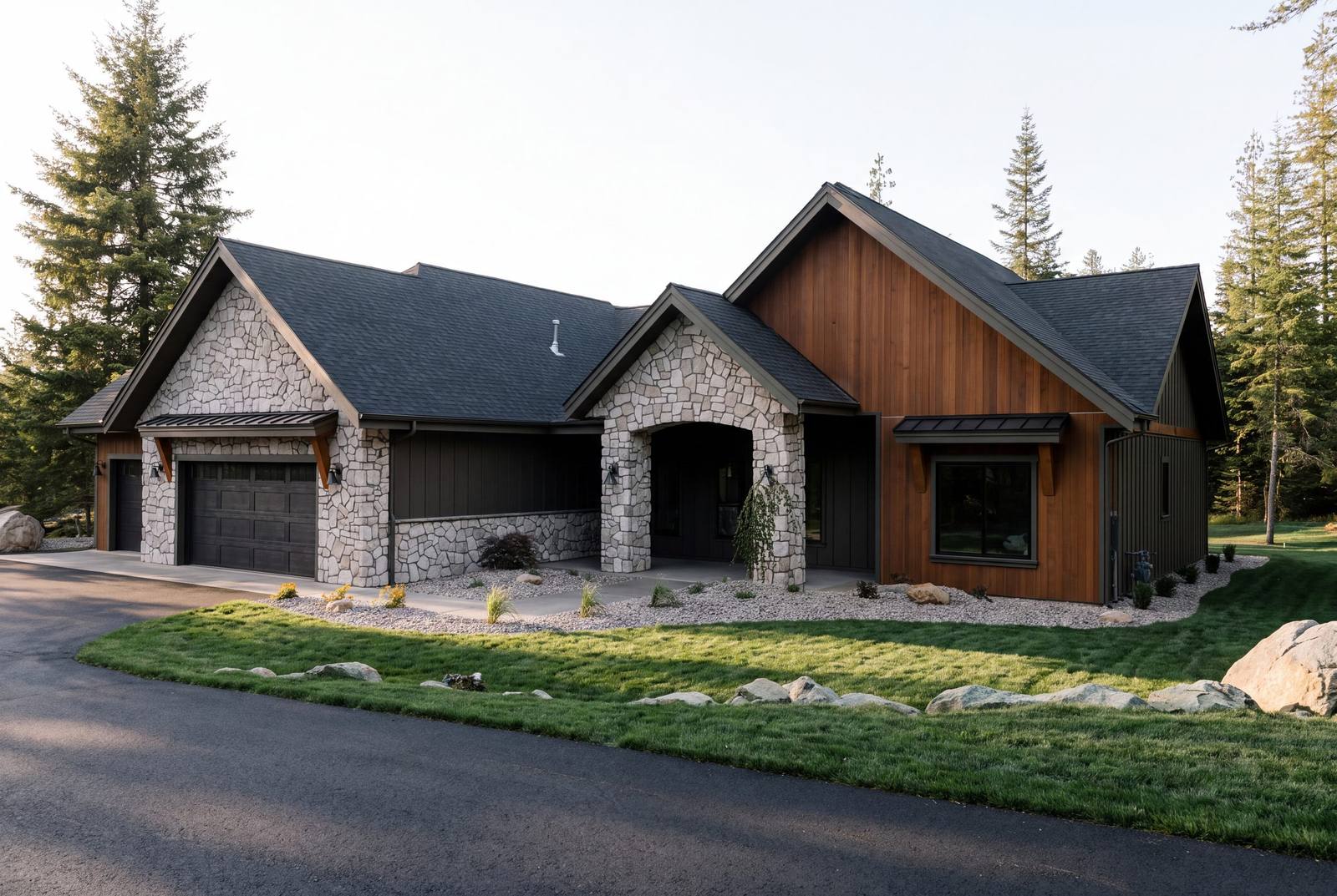 Single-level custom home in board and batten and stone on open ground